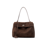 "Luxurious brown suede leather tote bag with crocodile-embossed texture and minimalist silver hardware, shown from the front."