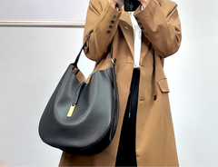 This exquisite accessory captures the essence of high-end fashion with its sophisticated design, making it an essential addition to any discerning wardrobe.