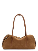 Brown handbag with a strap on a white background