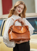 Sophisticated Trendy Designer Inspired Tot Crossbody Bag for Stylish Girls from High Quality Leather