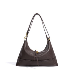 A leather shoulder bag with a woven leather trim detail, gold-tone hardware, and a zipper closure, shown against a plain white background.
