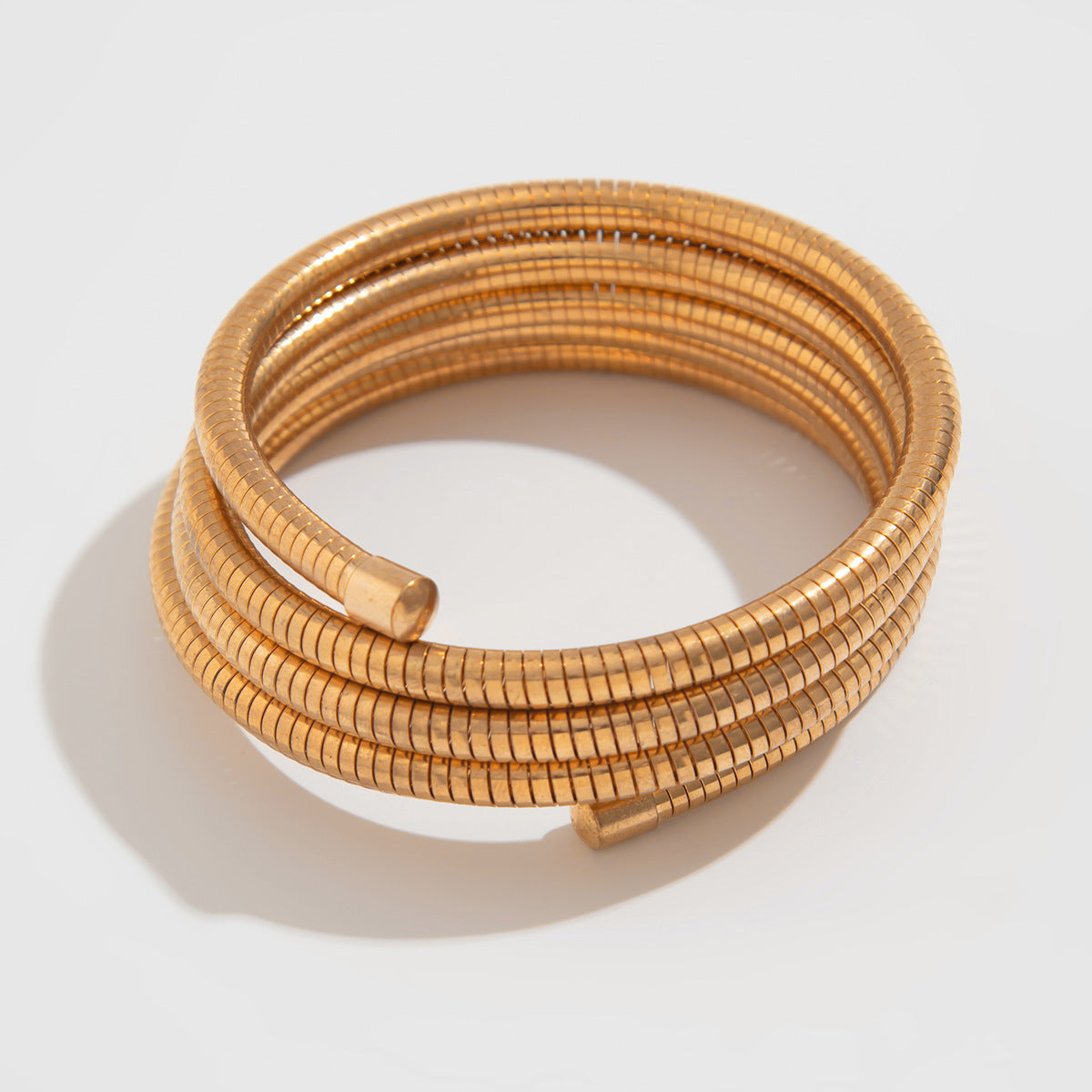 Elegant Gold and Silver Coil Wrap Bracelet – Bold Multi-Layered Statement Bangle